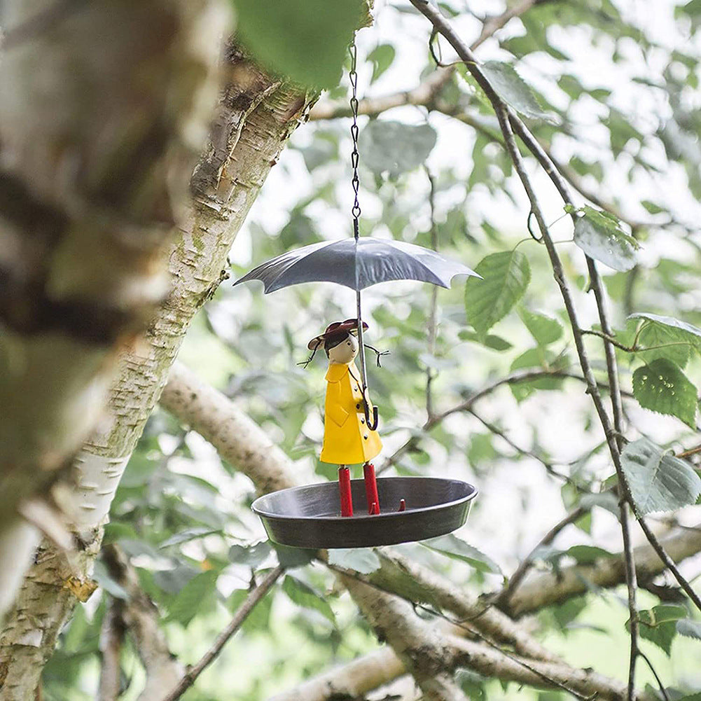 A decorated feeding house with an umbrella