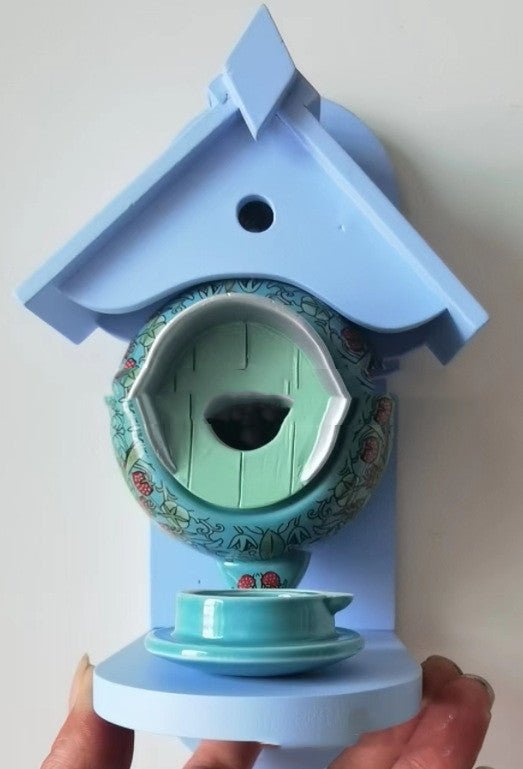 Bird feeding house