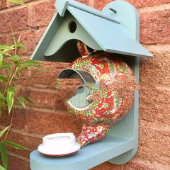 Bird feeding house